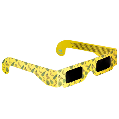 Banana solar eclipse glasses on a transparent background