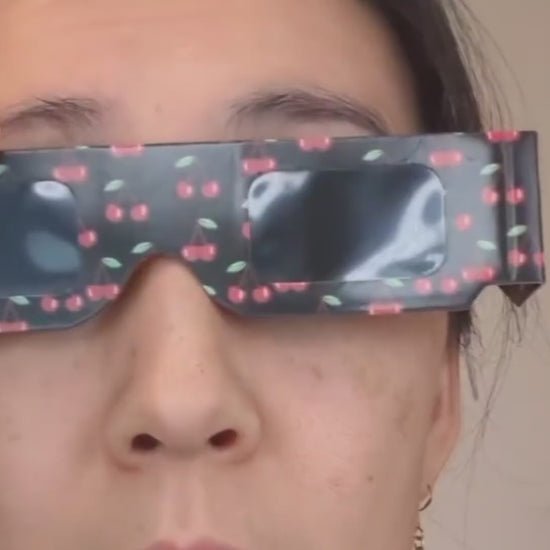Tember Cherry eclipse glasses fitted over prescription glasses